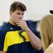 Michigan offensive lineman Taylor Lewan smiles as he speaks during a press conference at the Al Glick Fieldhouse on Monday, August 5, 2013. Melanie Maxwell | AnnArbor.com